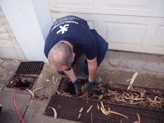 debris and leaves blocking drain